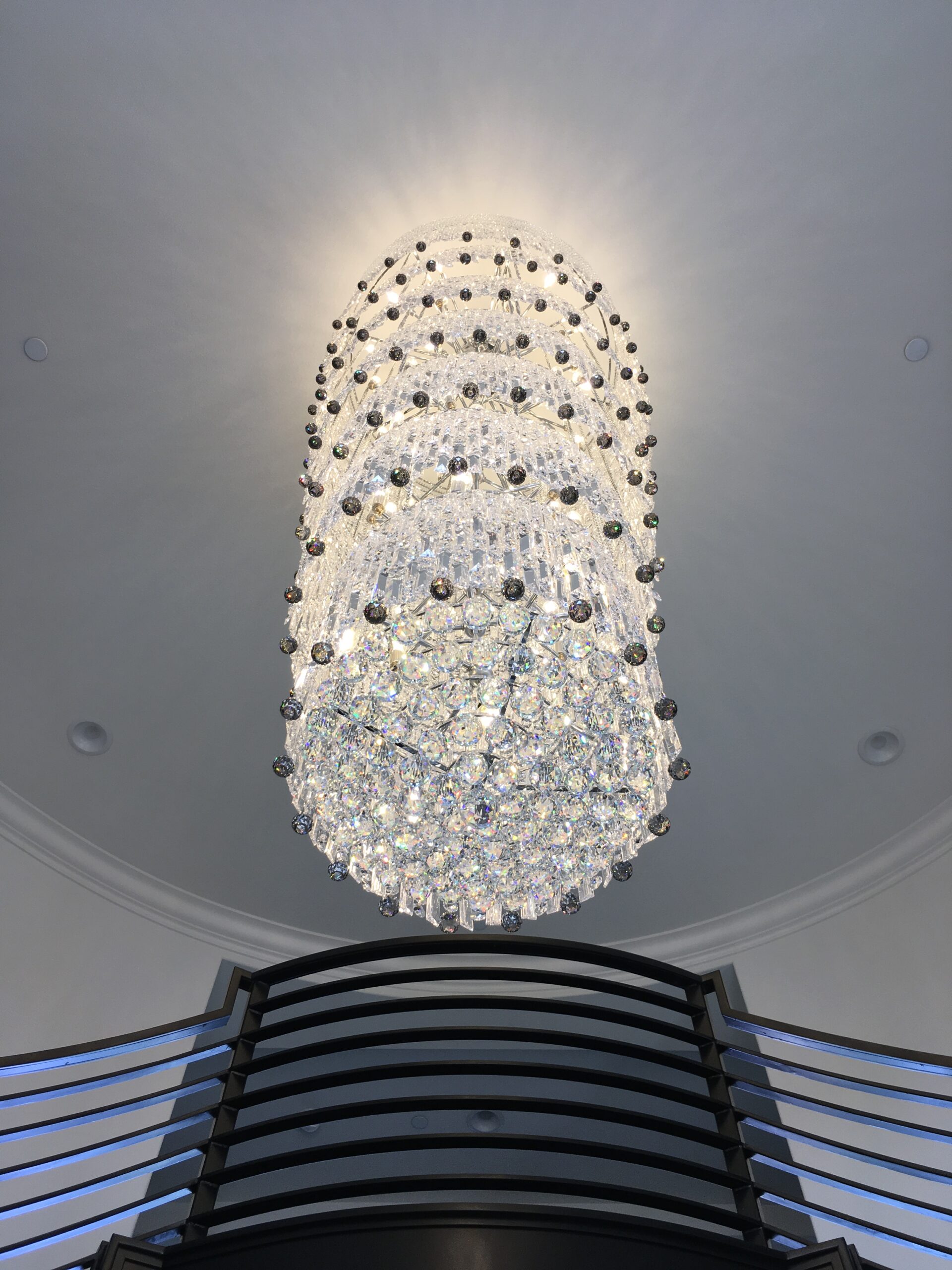 Custom-designed crystal chandelier installed in a Los Angeles dining room